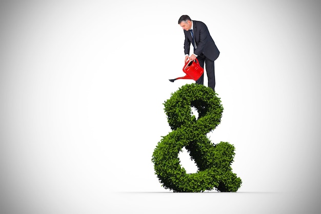 Composite image of mature businessman using watering can