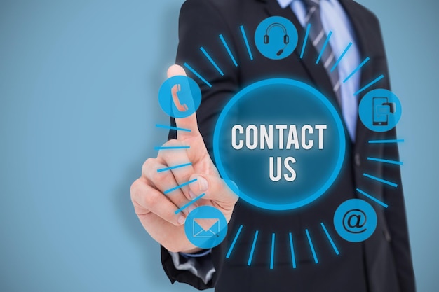 composite image of mid section of businessman pointing something up
