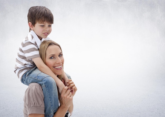 Photo composite image of parent and child against neutral grey background