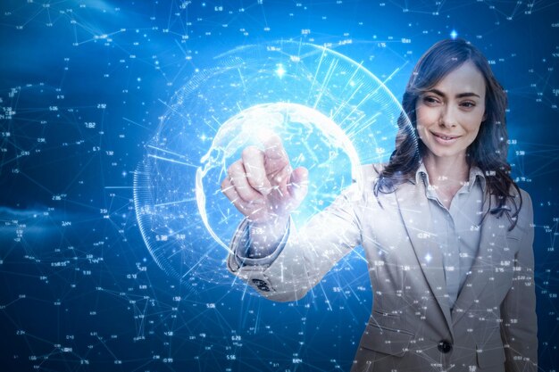 Composite image of portrait of businesswoman touching invisible screen