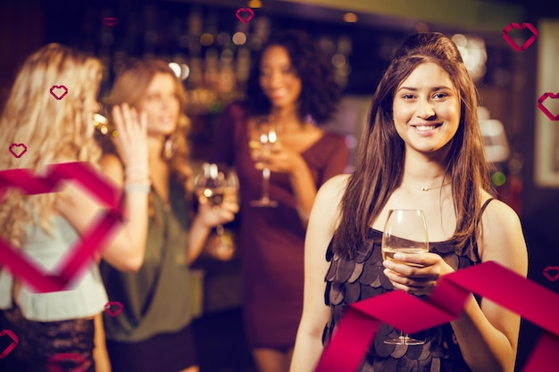 Composite image of portrait of happy friends having drink