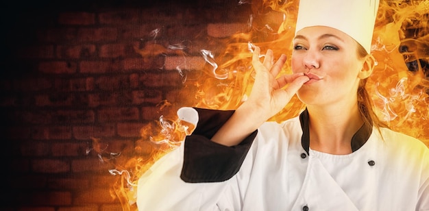 Composite image of portrait of a woman chef satisfying