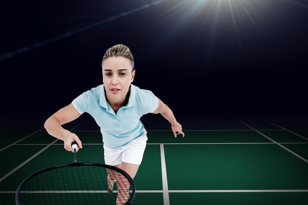 Composite image of pretty blonde playing badminton