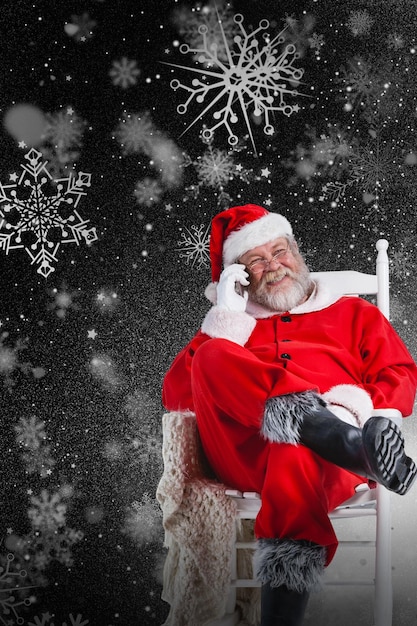 Composite image of santa claus talking on mobile phone