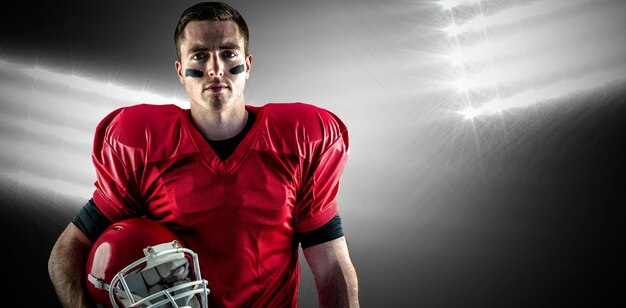 Photo composite image of a serious american football player looking at camera