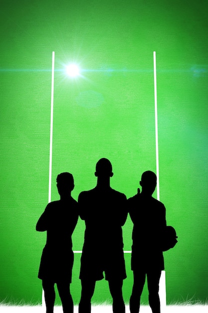 Composite image of silhouette of rugby player