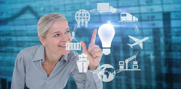 Composite image of smiling businesswoman pointing