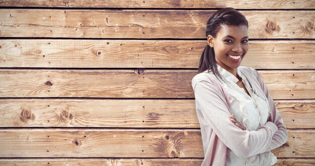 Composite image of smiling crestive business woman