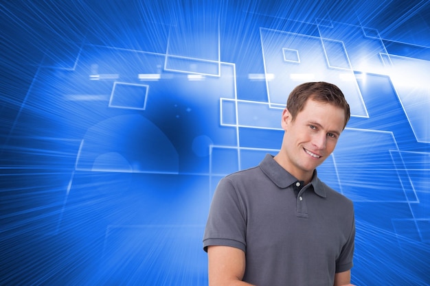 Composite image of smiling young man with tablet computer