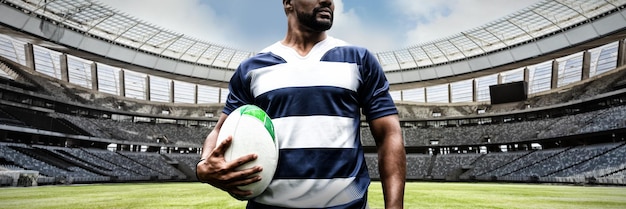 Composite image of strong rugby player