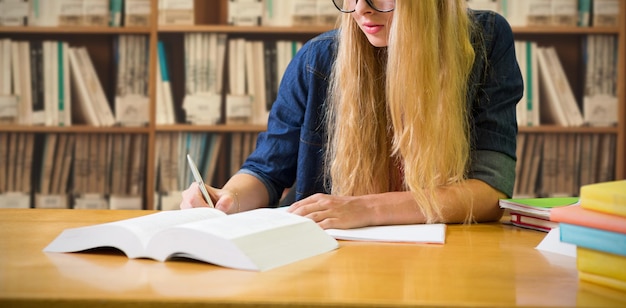 Composite image of student studying in the library