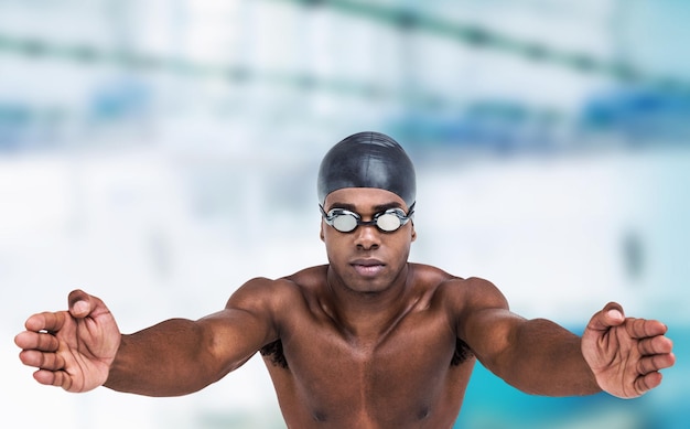 Composite image of swimmer ready to dive