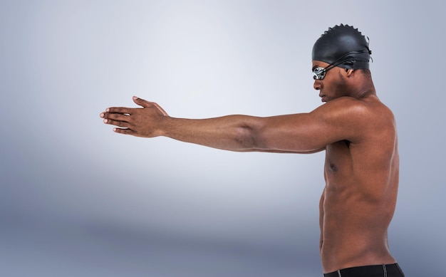 Composite image of swimmer ready to dive