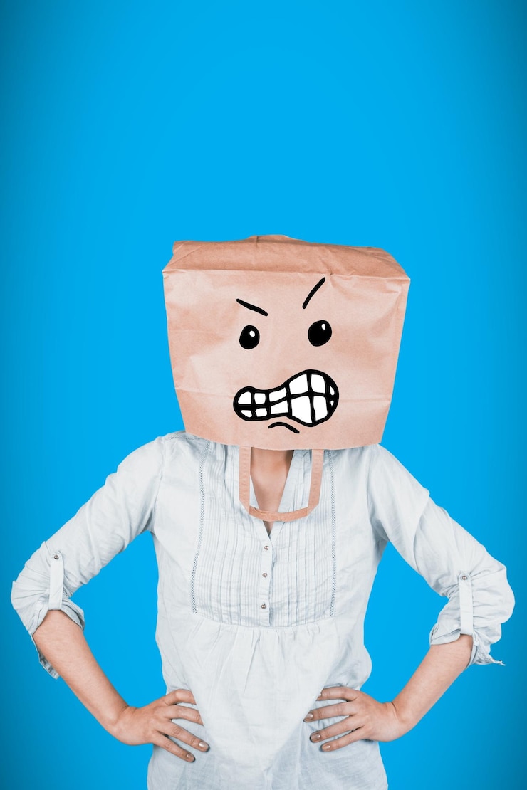 फोटो composite image of woman covering head with brown paper bag