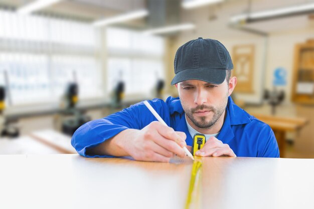 Composite image of worker measuring table