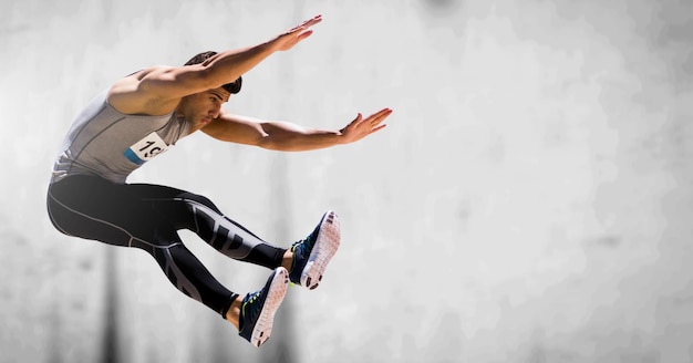 Composition of athletic man jumping on gray background