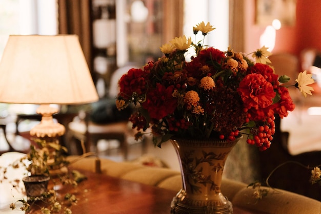 Composition of autumn flowers in the interior