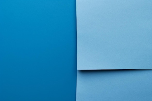 Composition of blue paper sheets background