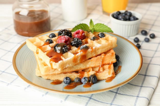 Composition of breakfast with belgian waffles