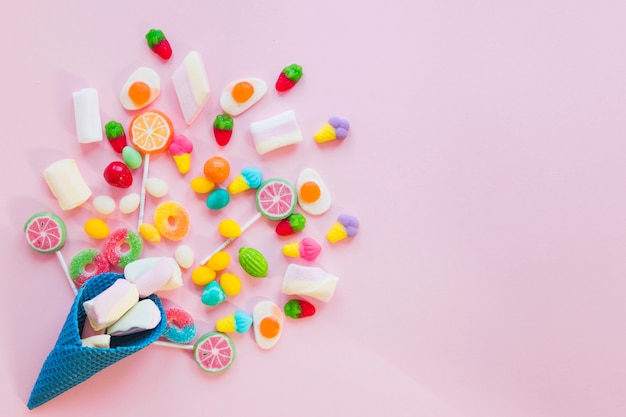 Photo composition of candies and waffle cone