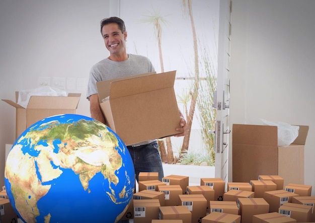 Composition of cardboard boxes with globe, man carrying box,\
unpacking in new home. moving house, global shipment and delivery\
concept digitally generated image.