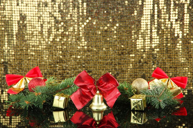 Composition of the Christmas decorations on golden surface