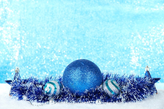 Photo composition of the christmas decorations on light blue background