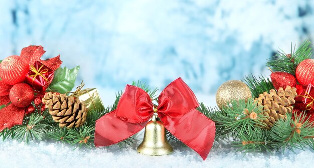 Composition of the Christmas decorations on light winter background