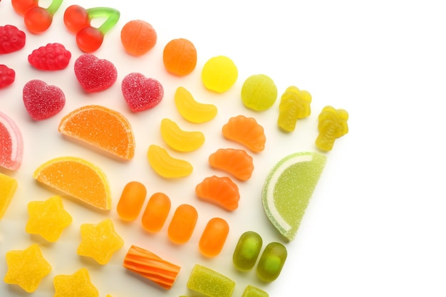 Photo composition of colorful jelly candies on white background