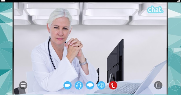 Composition of female doctor using laptop on video call interface screen