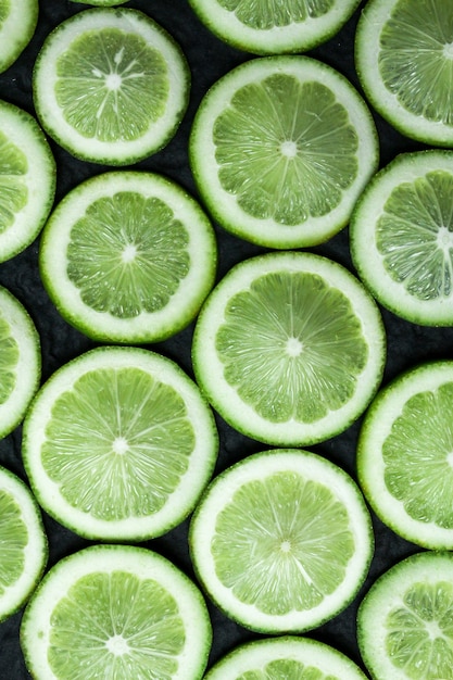 Composition of fresh green lemon slices