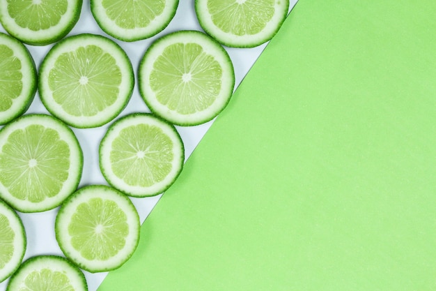 Photo composition of fresh green lemon slices