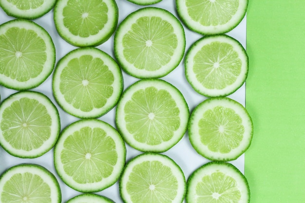 Composition of fresh green lemon slices