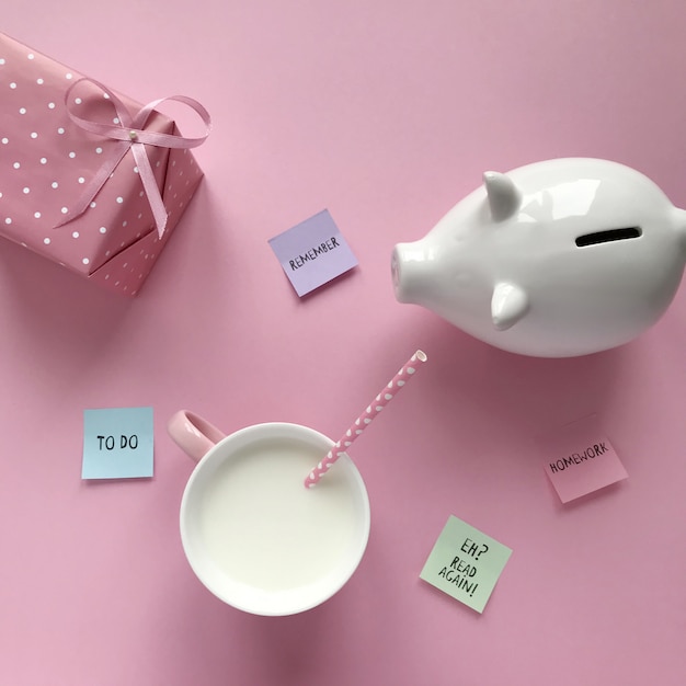 Photo composition of gift and piggy bank