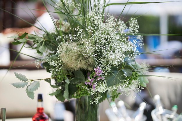 Composition of green dried flowers and wildflowers