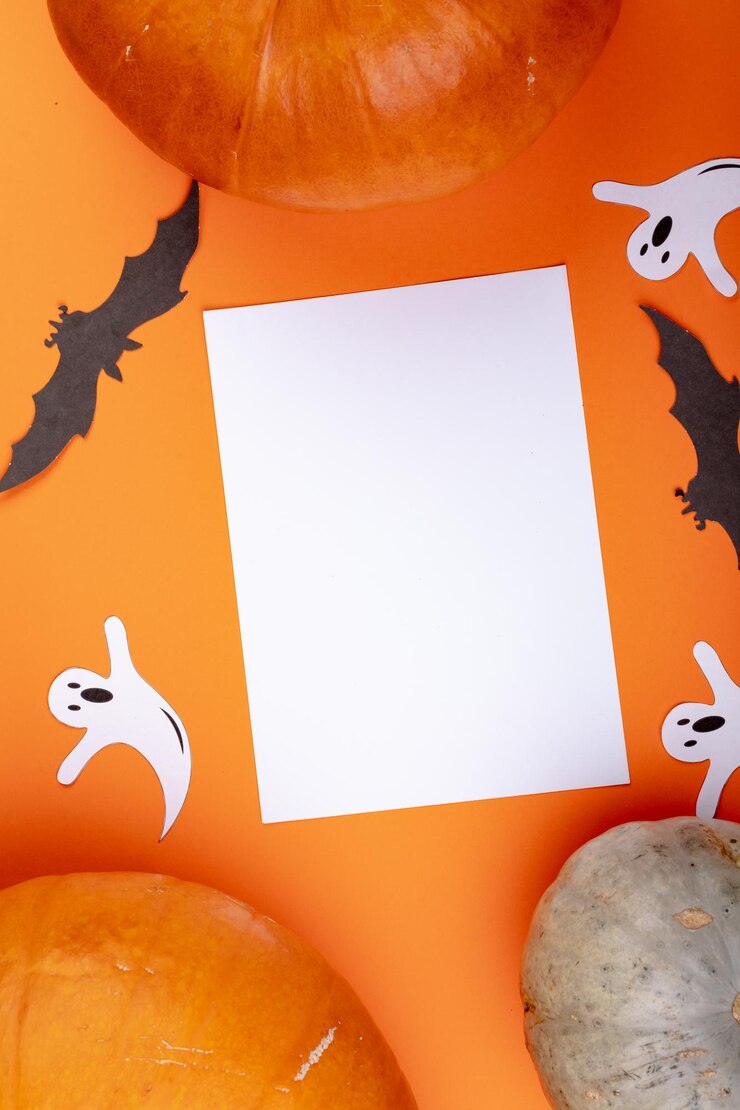 Photo composition of halloween decoration with pumpkin and sheet with copy space on orange background. halloween tradition and celebration concept digitally generated image.