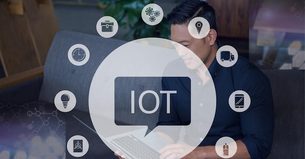 Composition of iot icon with network of connections over man using tablet