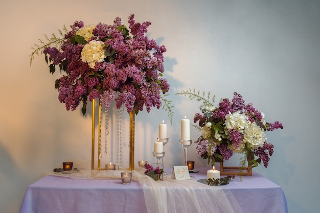 Photo composition of lilac flowers on the table