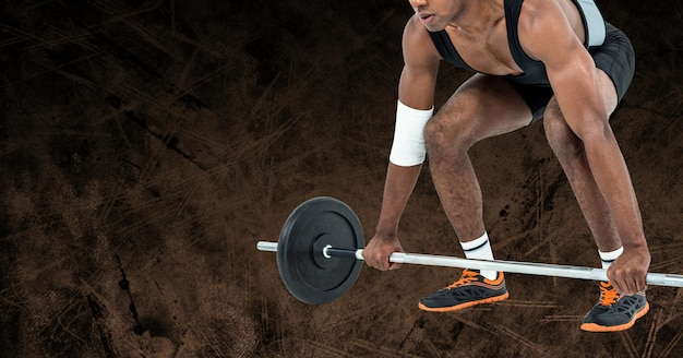 Composition of low section of strong african american man lifting barbell with copy space