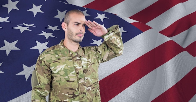 Composition of male soldier saluting over american flag