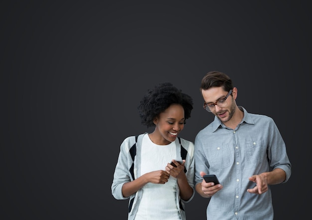 Composition of man and woman using smartphones with copy space on grey background