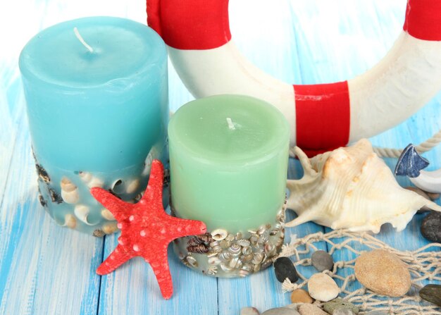 Composition of marine decor on wooden table closeup