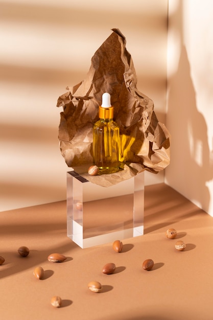 Photo composition of natural argan oil dropper