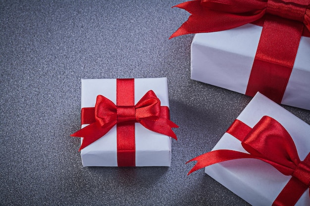 Composition of packed present boxes on grey surface holidays concept