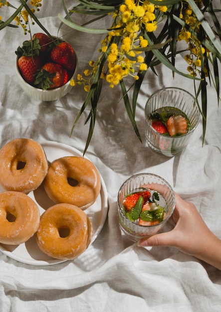 Photo composition of picnic goodies on a blanket