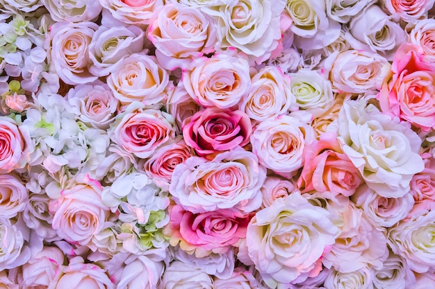 Composition of pink orange and peach roses flowers