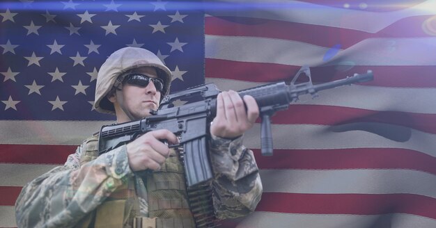 Photo composition of soldier shooting against american flag