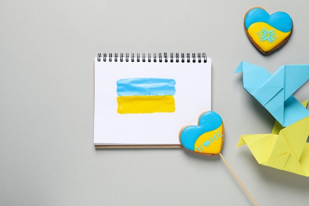 Composition for soncept Save Ukraine on light gray background top view