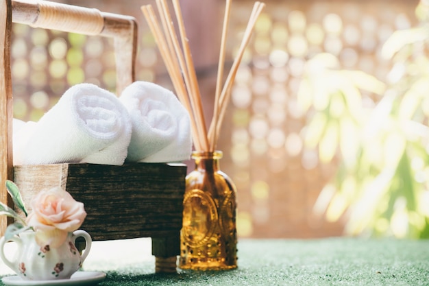 Composition of spa treatment on wooden table.