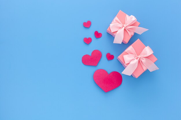 Composition of  two gift boxes with ribbon and hearts